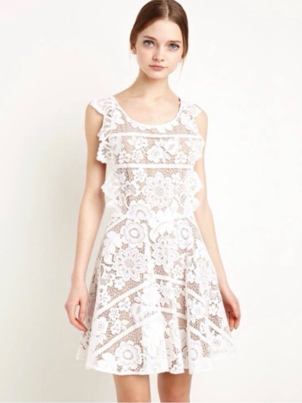 For Love and Lemon Giani White lace apron mini dress with open back and sides.